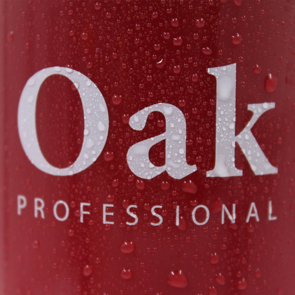 Red container with 'Oak Professional' text and water droplets on a red background